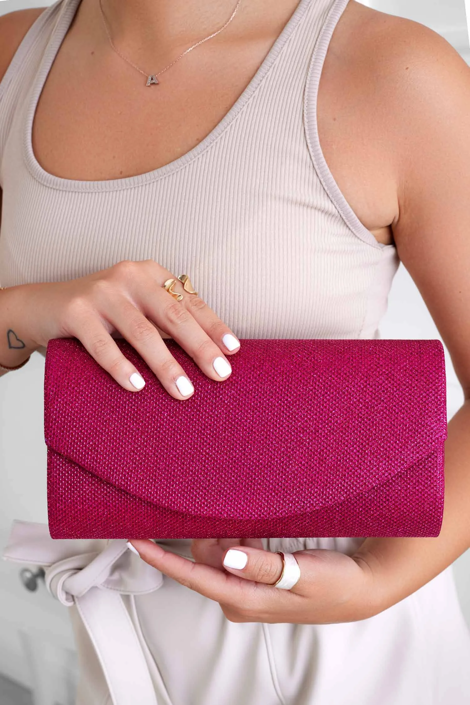 Borsa pochetta fuxia B220 in tessuto laminato