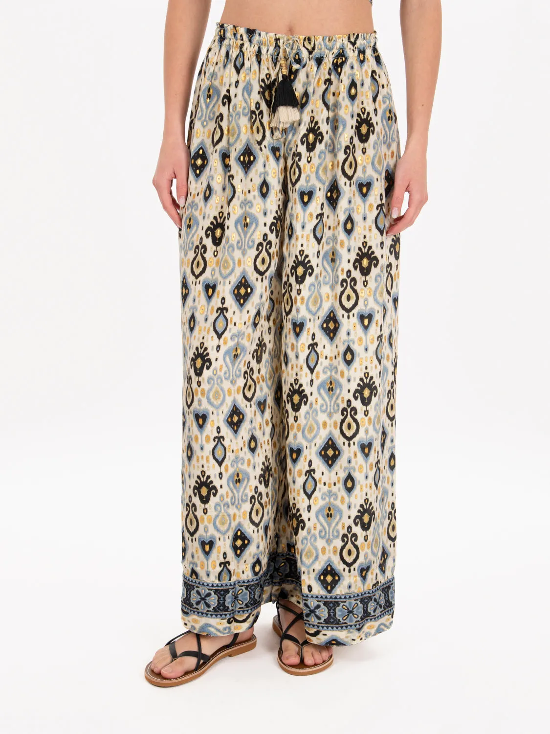 Pantaloni palazzo con nappine multicolor