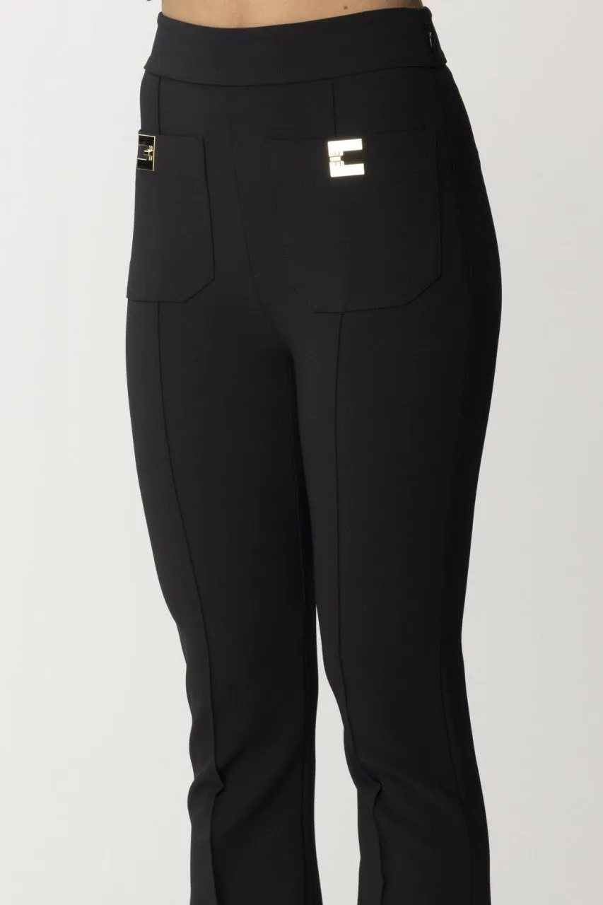 Pantaloni palazzo con placche logate Nero